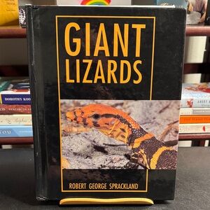 Giant Lizards Book by Robert George Sprackland - Black and Orange Cover